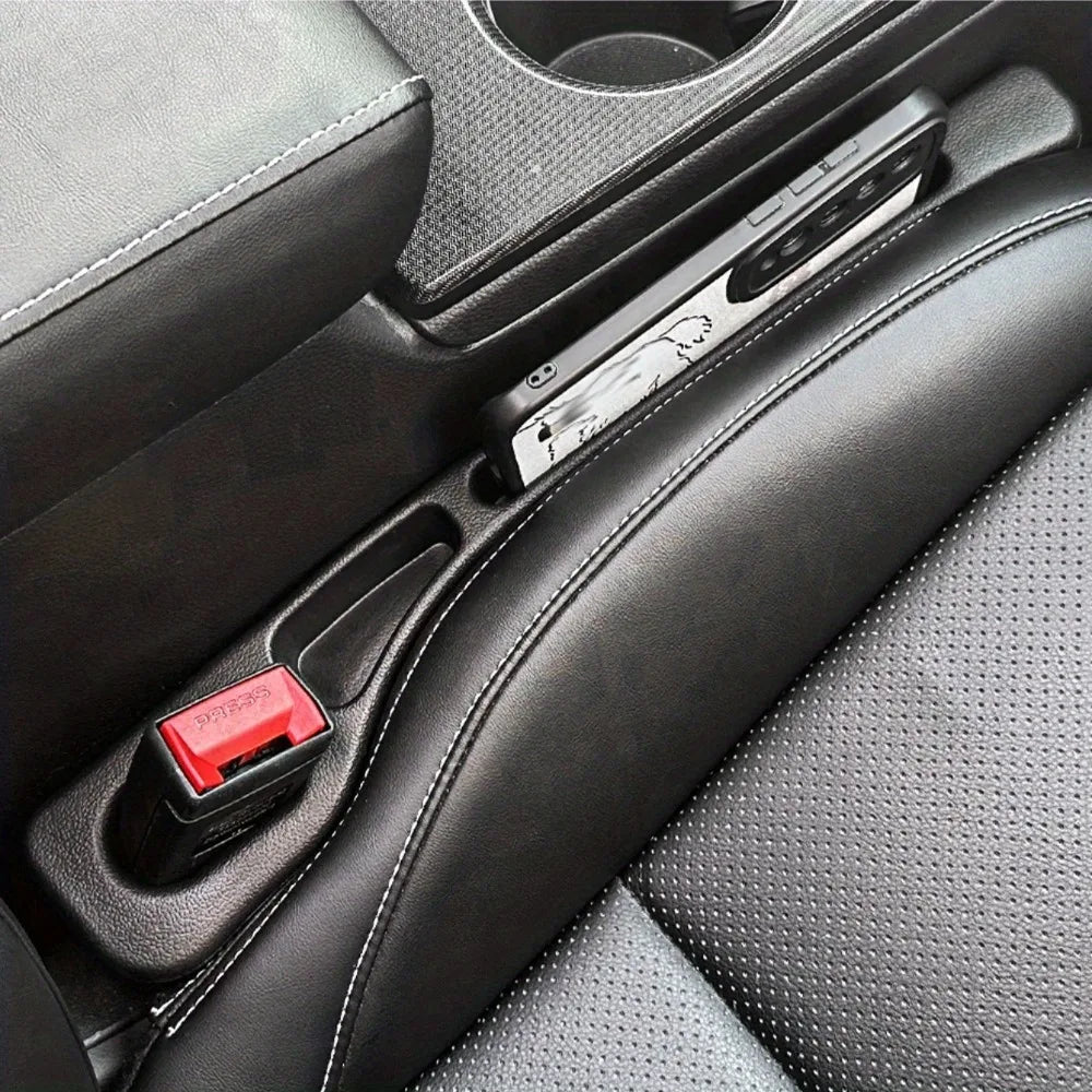 Car seat gap organizers installed beside a center console