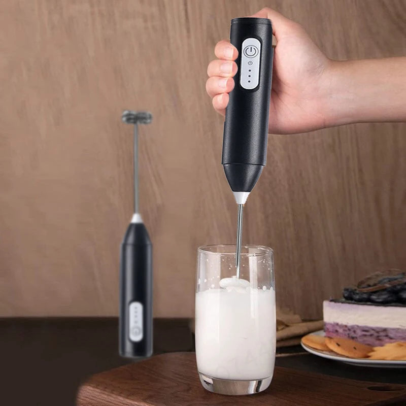 Rechargeable milk frother in black – controls and handle detail