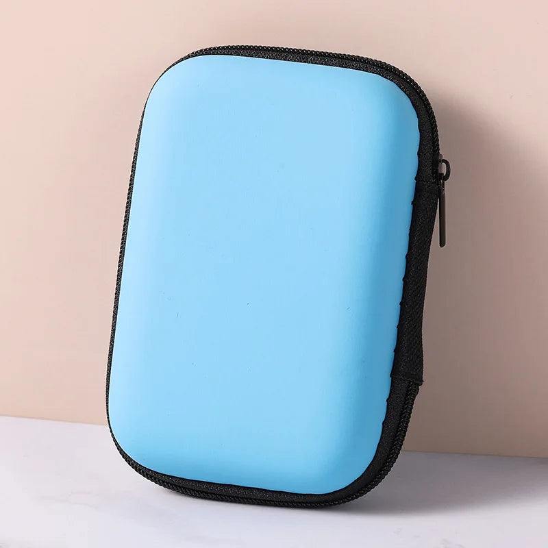 Portable cable and earbud storage pouch