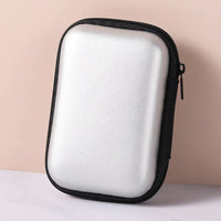 Thumbnail for Small tech accessories stored in case