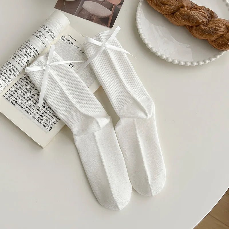 Japanese JK Sweet Bowknot Tied Middle Tube Socks Women Heel Bow Socks Casual Black White Pile Socks Girls Sports Cotton Socks - InspiredGrabs.com