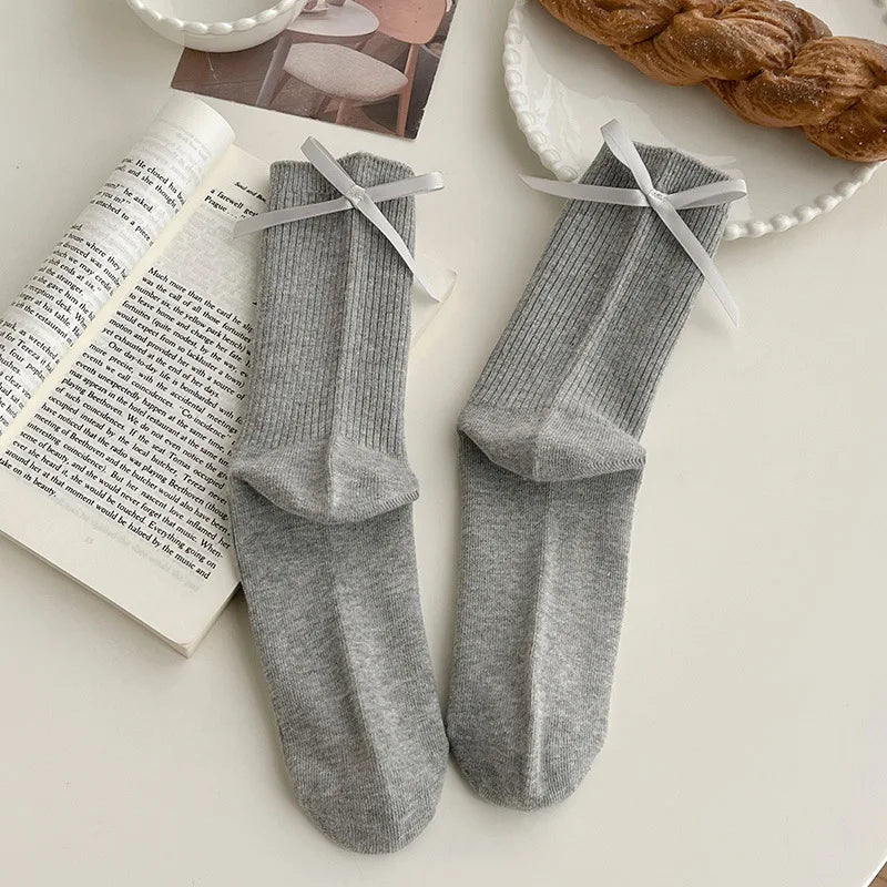 Japanese JK Sweet Bowknot Tied Middle Tube Socks Women Heel Bow Socks Casual Black White Pile Socks Girls Sports Cotton Socks - InspiredGrabs.com