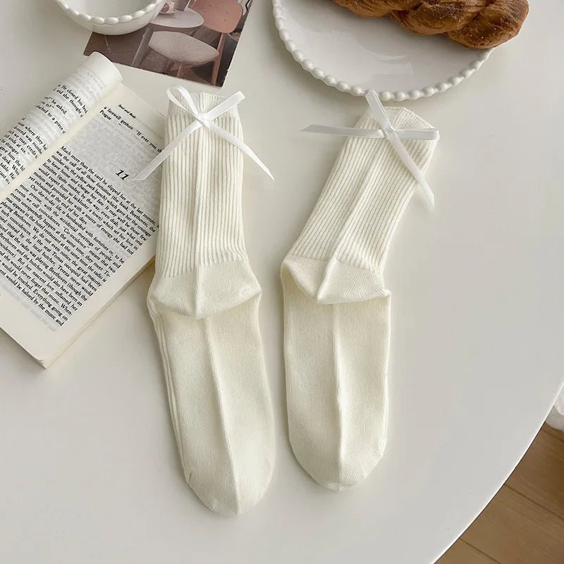 Japanese JK Sweet Bowknot Tied Middle Tube Socks Women Heel Bow Socks Casual Black White Pile Socks Girls Sports Cotton Socks - InspiredGrabs.com