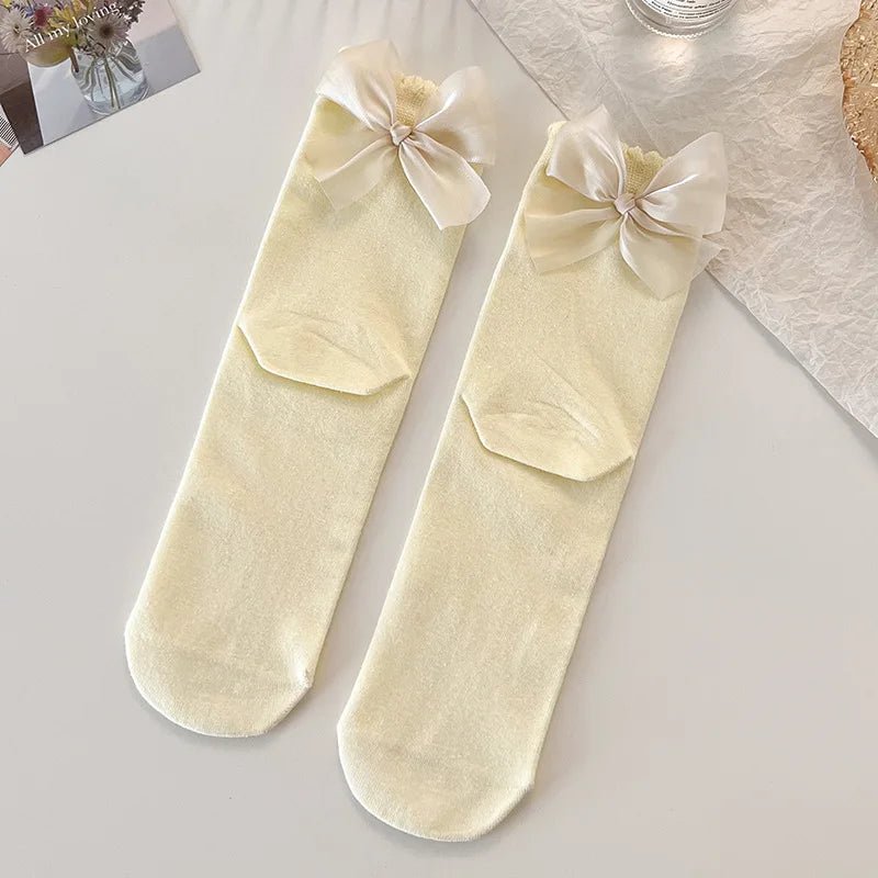 Japanese JK Sweet Bowknot Tied Middle Tube Socks Women Heel Bow Socks Casual Black White Pile Socks Girls Sports Cotton Socks - InspiredGrabs.com