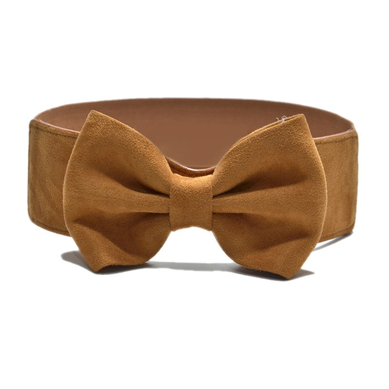 Enhance your style with our chic women's elastic wide belt. - InspiredGrabs.com