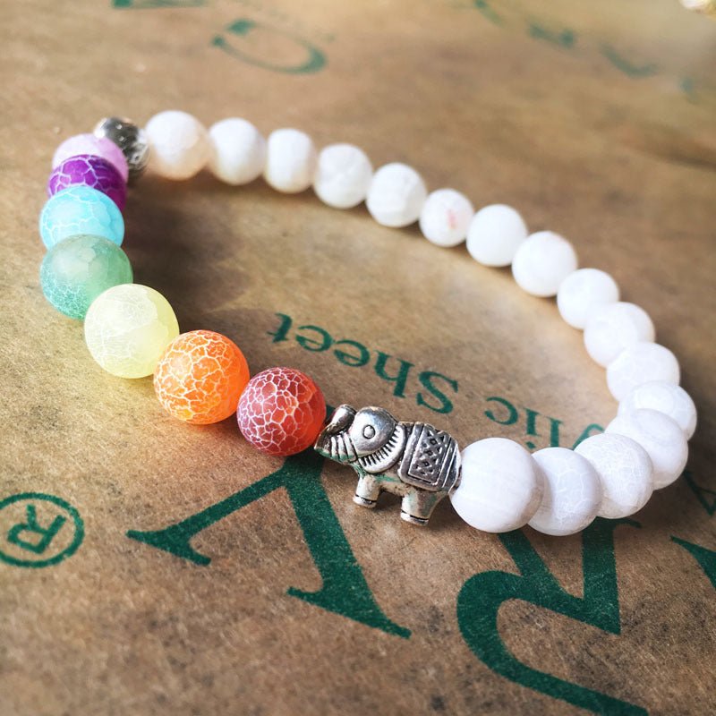 Experience the vibrant energy of the Elephant Colorful Yoga Bracelet. - InspiredGrabs.com