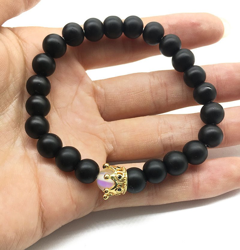 Experience the vibrant energy of the Elephant Colorful Yoga Bracelet. - InspiredGrabs.com