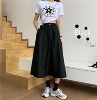 Thumbnail for Flaunt your style with an effortlessly chic mid-length puffy skirt. - InspiredGrabs.com