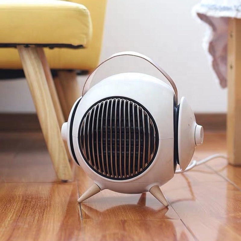 Get cozy with our innovative household heater featuring a convenient and movable air heater. Stay warm wherever you go! - InspiredGrabs.com