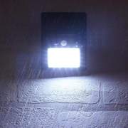 Illuminate your outdoor space with the energy-saving and waterproof LED solar Wall Light! - InspiredGrabs.com