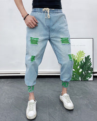 Thumbnail for Introducing Cutting-edge Men's Jeans with Fashionable Distressed Details - InspiredGrabs.com