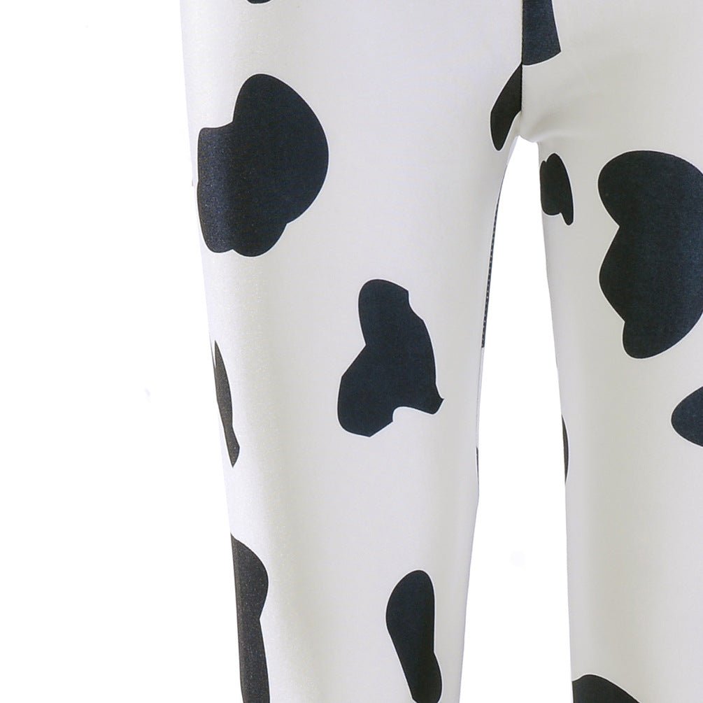 Introducing our sleek and stylish Cow Black Spot Tight Leggings - InspiredGrabs.com