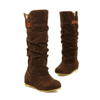 Thumbnail for Keep cozy and fashionable this winter with our exceptional mid-calf snow boots.