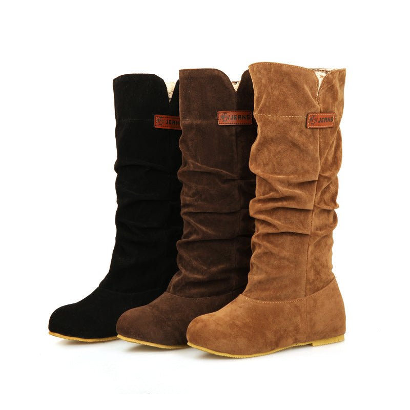 Mantente abrigado y elegante este invierno con nuestras fabulosas botas para la nieve de tubo medio.