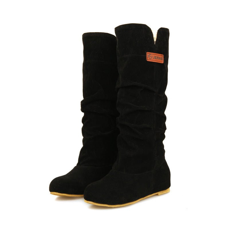 Mantente abrigado y elegante este invierno con nuestras fabulosas botas para la nieve de tubo medio.