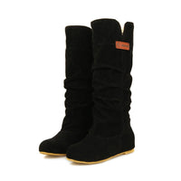 Thumbnail for Keep cozy and fashionable this winter with our exceptional mid-calf snow boots.