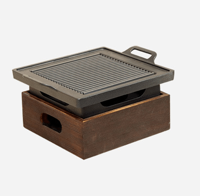 The delicious taste of Korean-style grilled food with our Wooden Seat Grill Pan - InspiredGrabs.com