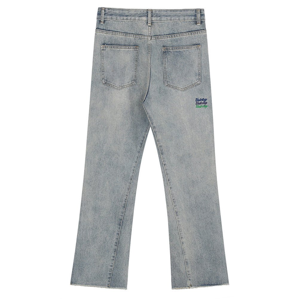 Turn heads with our brand-new line of letter embroidery jeans for men. - InspiredGrabs.com