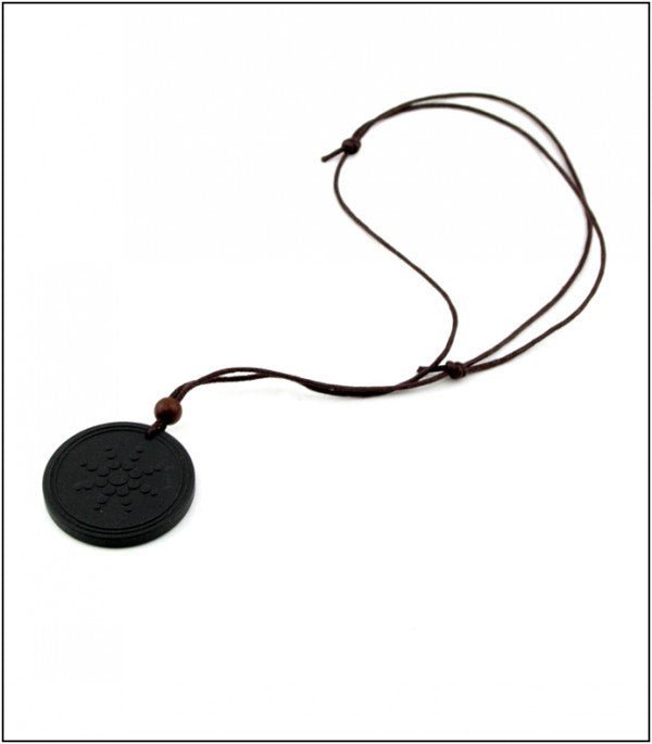 Unleash the power of volcanic rock with the Quantum Pendant - the ultimate source of anion energy. - InspiredGrabs.com